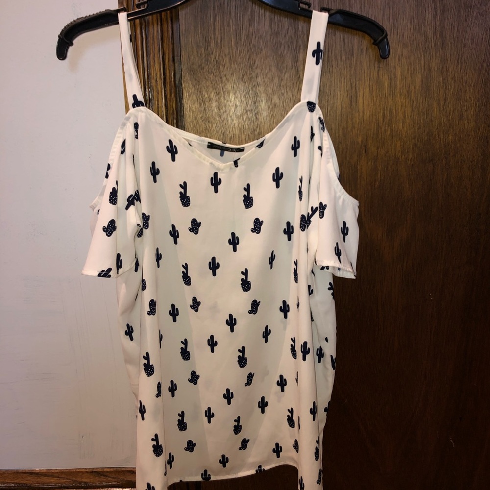 White open shoulder blouse with a cactus pattern
